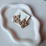 Textured Roundy Cross Drop Earrings in White